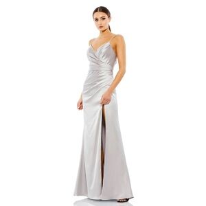 Mac Duggal Silver gown sz 10. 
Get ready for prom or graduation parties!!